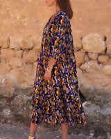 Theresa - patterned midi dress with V-neck and three-quarter sleeves