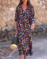 Theresa - patterned midi dress with V-neck and three-quarter sleeves
