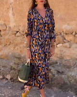 Theresa - patterned midi dress with V-neck and three-quarter sleeves
